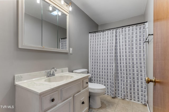 full bath with vanity, a shower with shower curtain, toilet, and tile patterned flooring