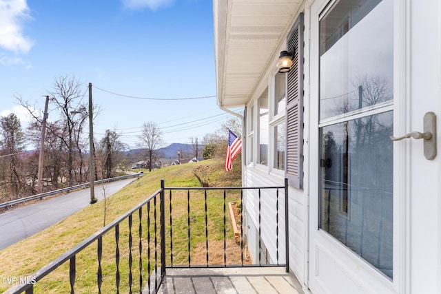 balcony featuring a mountain view