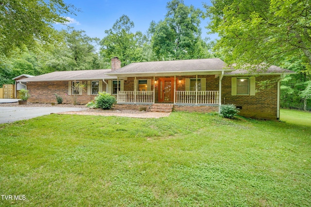 631 Bowmantown Rd, Telford, TN 37690 - ranch-style house featuring covered porch, a chimney, brick siding, and a front lawn
