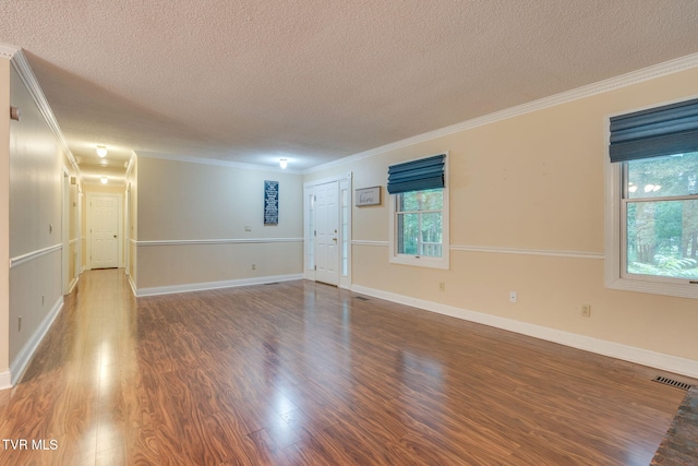 631 Bowmantown Rd, Telford, TN 37690 - empty room with a textured ceiling, wood finished floors, ornamental molding, and baseboards