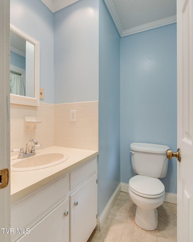 631 Bowmantown Rd, Telford, TN 37690 - bathroom with crown molding, vanity, toilet, tile patterned flooring, and baseboards