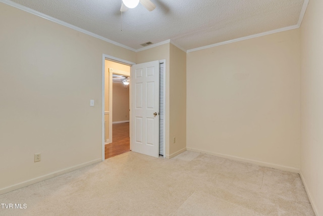 631 Bowmantown Rd, Telford, TN 37690 - carpeted spare room featuring a ceiling fan, a textured ceiling, crown molding, and baseboards