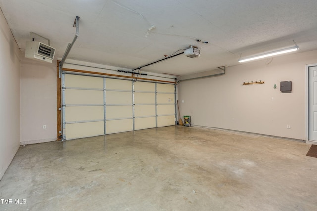 631 Bowmantown Rd, Telford, TN 37690 - garage with a garage door opener and a heating unit