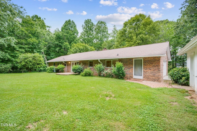 631 Bowmantown Rd, Telford, TN 37690 - single story home featuring a front yard, brick siding, and a chimney