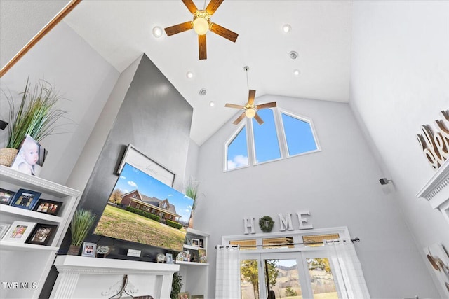 interior space featuring recessed lighting, high vaulted ceiling, and ceiling fan