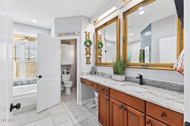 full bath featuring tile patterned flooring, toilet, double vanity, a bathtub, and a sink