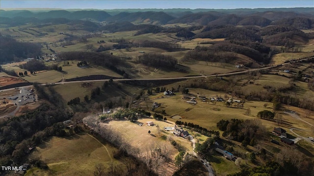 birds eye view of property featuring a rural view