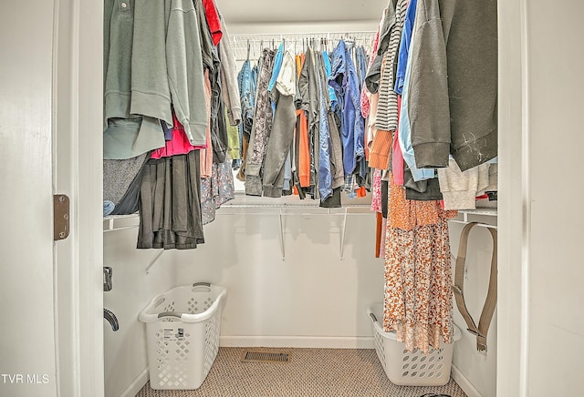 walk in closet featuring visible vents