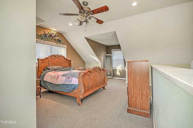 bedroom with light carpet, a ceiling fan, recessed lighting, baseboards, and vaulted ceiling