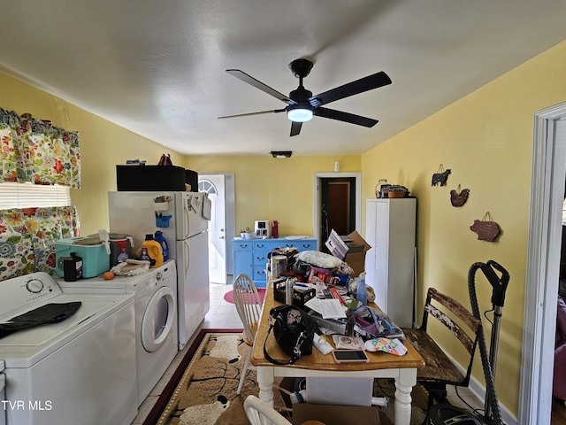 laundry area featuring laundry area, washing machine and dryer, and a ceiling fan