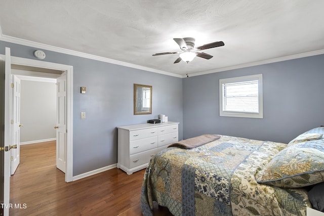 bedroom featuring ceiling fan, baseboards, dark wood-style flooring, and ornamental molding