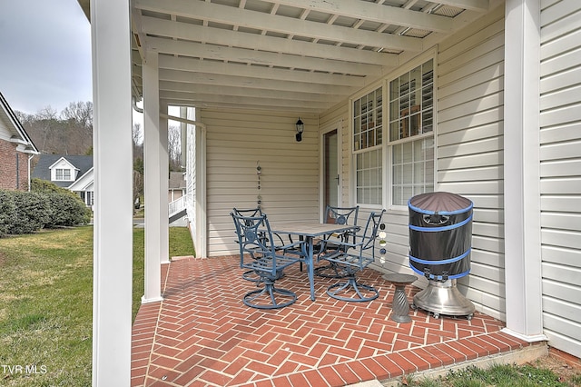 view of patio with outdoor dining space