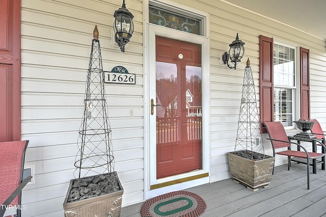 entrance to property with a porch