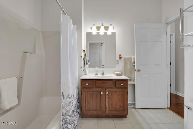 full bath featuring tile patterned floors and vanity