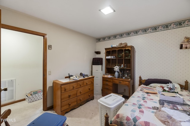 bedroom with visible vents, light carpet, baseboards, and wallpapered walls