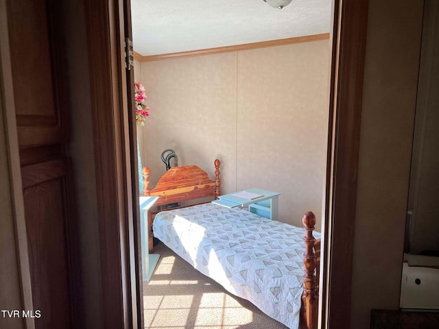 bedroom with ornamental molding