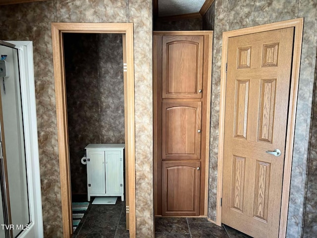 hallway with ornamental molding