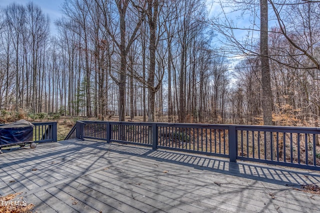 wooden terrace with grilling area