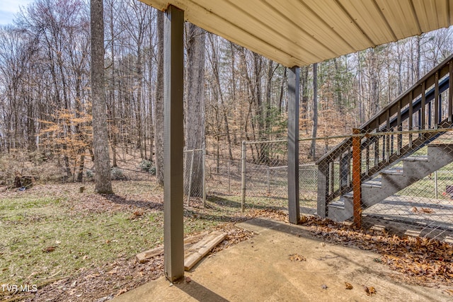 view of yard featuring a patio area and fence