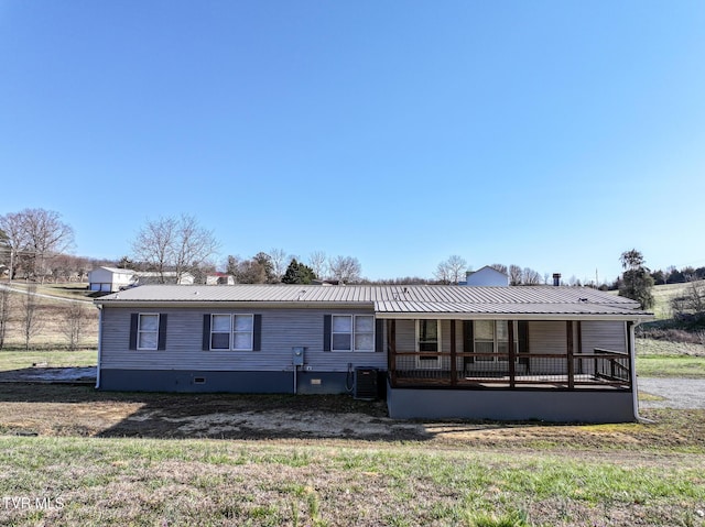 manufactured / mobile home with crawl space, central AC unit, a porch, and metal roof