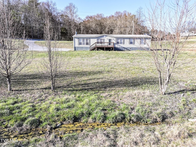 rear view of house with a deck