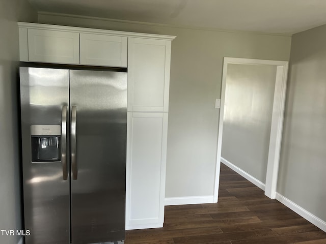 kitchen featuring white cabinetry, dark wood-style floors, stainless steel fridge with ice dispenser, and baseboards