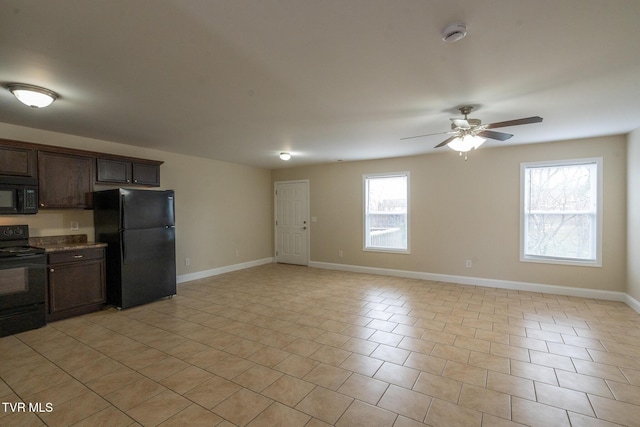 kitchen featuring dark brown cabinets, baseboards, ceiling fan, light tile patterned floors, and black appliances