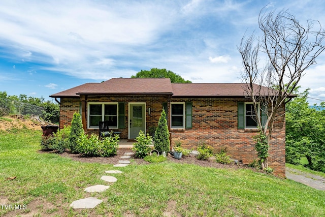 1212 Rocky Hollow Rd, Jonesborough, TN 37659 - view of front of house with a front lawn, brick siding, covered porch, and roof with shingles