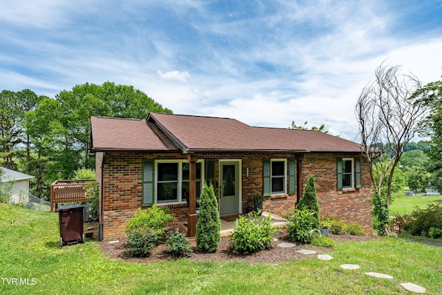 1212 Rocky Hollow Rd, Jonesborough, TN 37659 - view of front of house featuring brick siding, a front yard, and roof with shingles