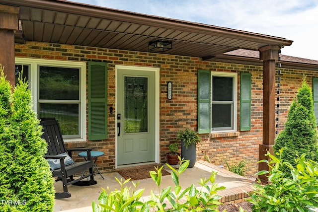 1212 Rocky Hollow Rd, Jonesborough, TN 37659 - property entrance with brick siding and a porch