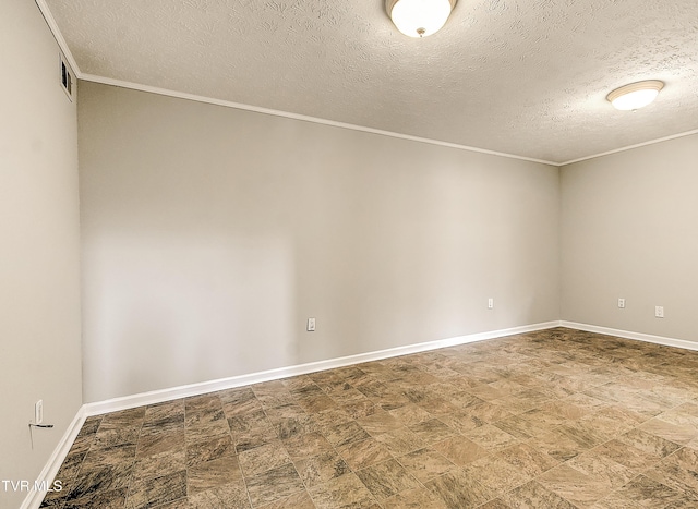 unfurnished room with a textured ceiling, baseboards, visible vents, and ornamental molding
