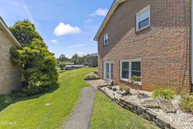 view of yard with french doors