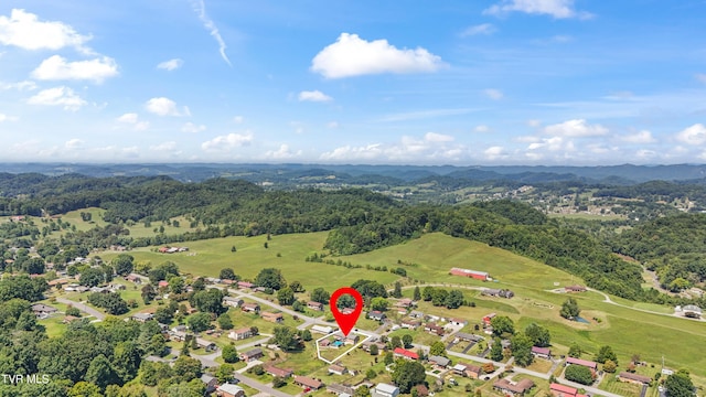 drone / aerial view with a view of trees