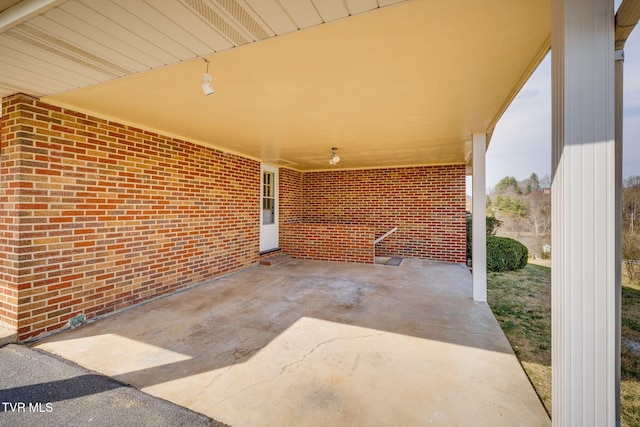 view of patio / terrace with a carport