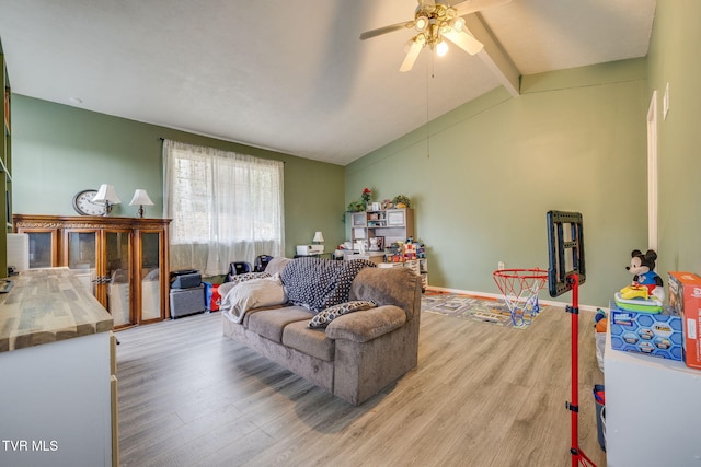 4511 Grace Dr, Kingsport, TN 37664 - living area featuring lofted ceiling with beams, baseboards, light wood-type flooring, and a ceiling fan