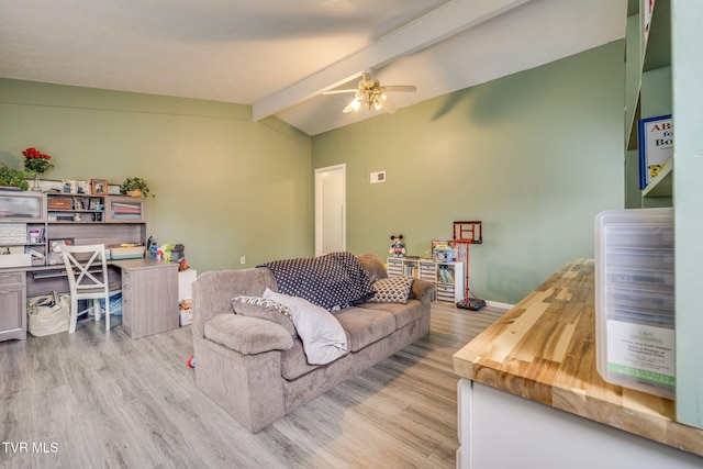 4511 Grace Dr, Kingsport, TN 37664 - living room featuring a ceiling fan, lofted ceiling with beams, light wood-style floors, and baseboards