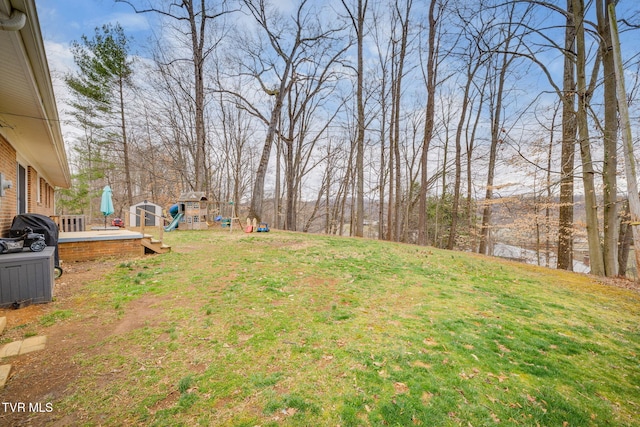 4511 Grace Dr, Kingsport, TN 37664 - view of yard with a deck and a playground