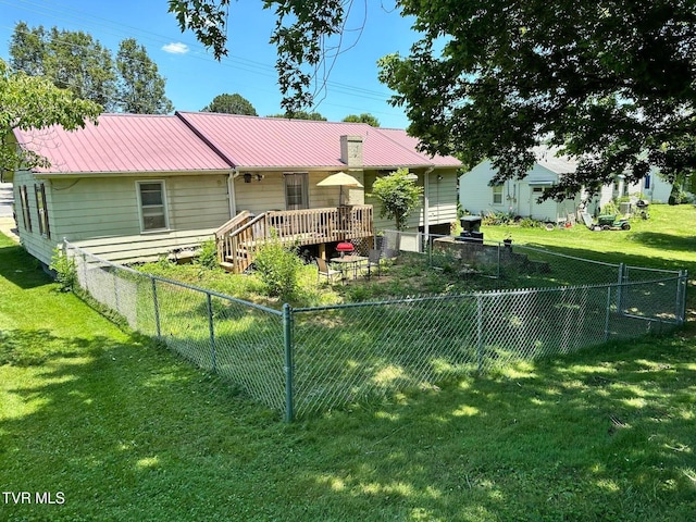 109 Chestnut St, Greeneville, TN 37745 - exterior space featuring a fenced backyard, metal roof, and a yard