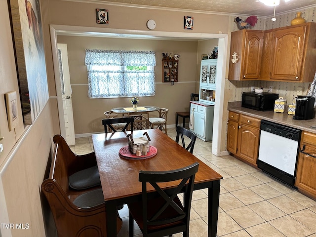 109 Chestnut St, Greeneville, TN 37745 - kitchen featuring tasteful backsplash, black microwave, dishwasher, ornamental molding, and light tile patterned flooring