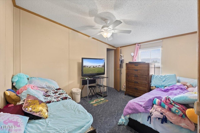 carpeted bedroom featuring a textured ceiling, vaulted ceiling, ceiling fan, and ornamental molding