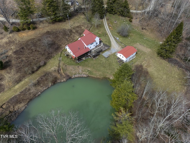 drone / aerial view with a water view
