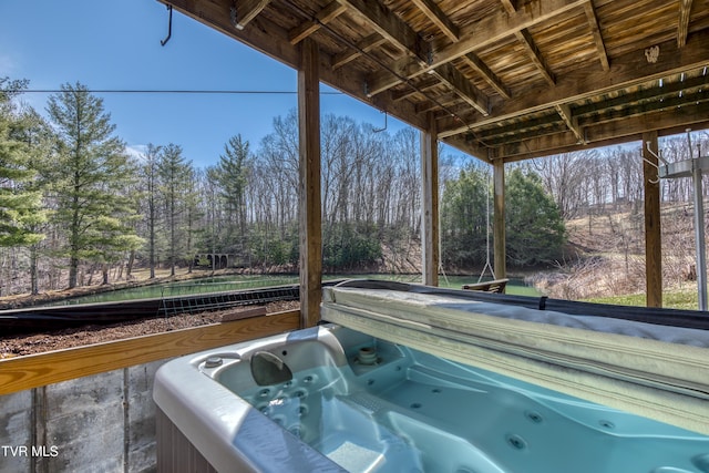 view of patio with a hot tub
