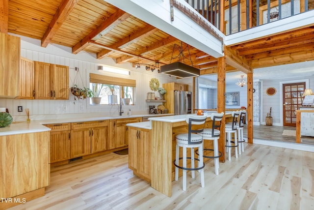 kitchen featuring wooden ceiling, smart refrigerator, light wood finished floors, and beam ceiling