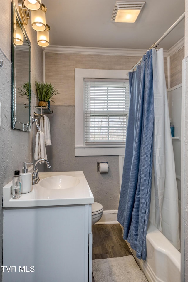 498 Texas Ave, Bristol, VA 24201 - full bathroom with vanity, a textured wall, crown molding, toilet, and wood finished floors