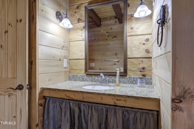 368 Ripshin Lake Rd, Roan Mountain, TN 37687 - bathroom featuring wooden walls and vanity