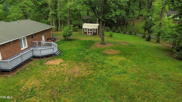 15399 Leatherwood Rd, Abingdon, VA 24210 - view of green lawn with an outdoor structure, a deck, and a storage shed
