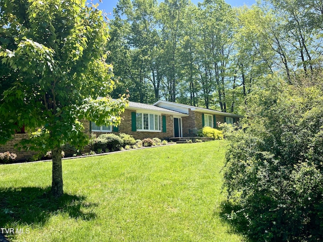 12226 Sands Rd, Coeburn, VA 24230 - view of front of home with brick siding and a front lawn