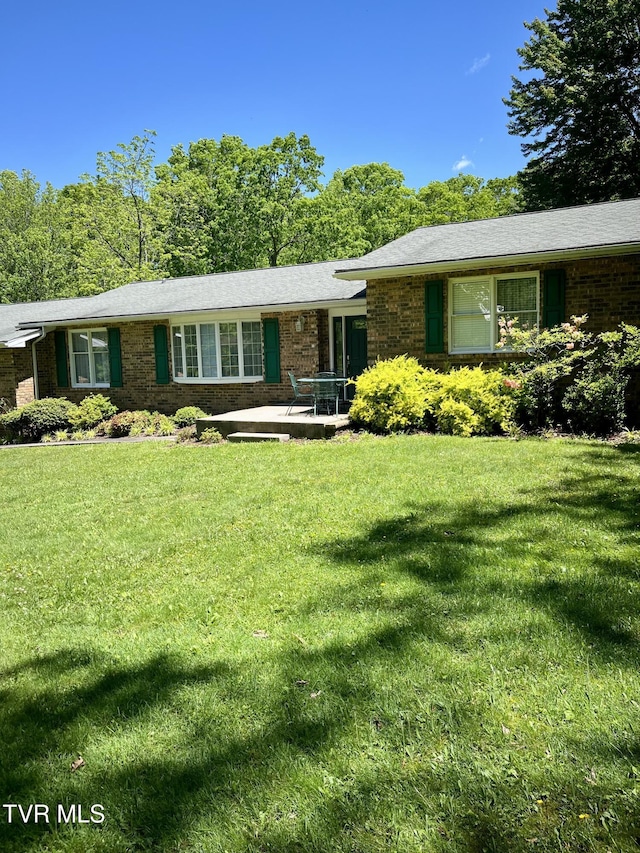 12226 Sands Rd, Coeburn, VA 24230 - view of front of property featuring brick siding and a front lawn