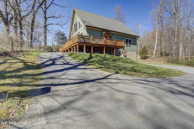 137 Unaka View Rd, Johnson City, TN 37601 - view of front of property featuring aphalt driveway, metal roof, and a wooden deck