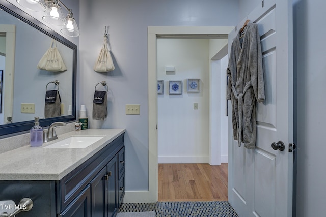 137 Unaka View Rd, Johnson City, TN 37601 - bathroom featuring vanity, wood finished floors, and baseboards